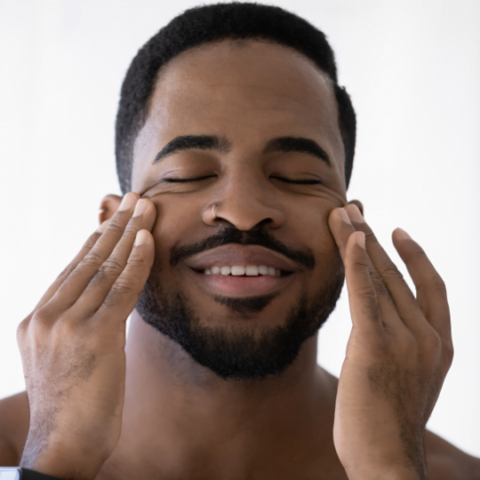 young-man-applying-night-cream-for-men-1000x600