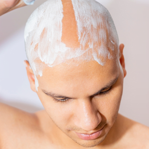 mencare-shave-man-bald-head-male-model-shaving-500x500